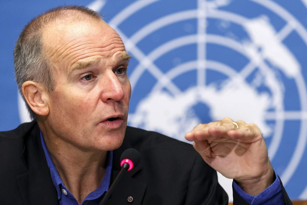 Dr Chris Dye speaking at a UN press conference.
