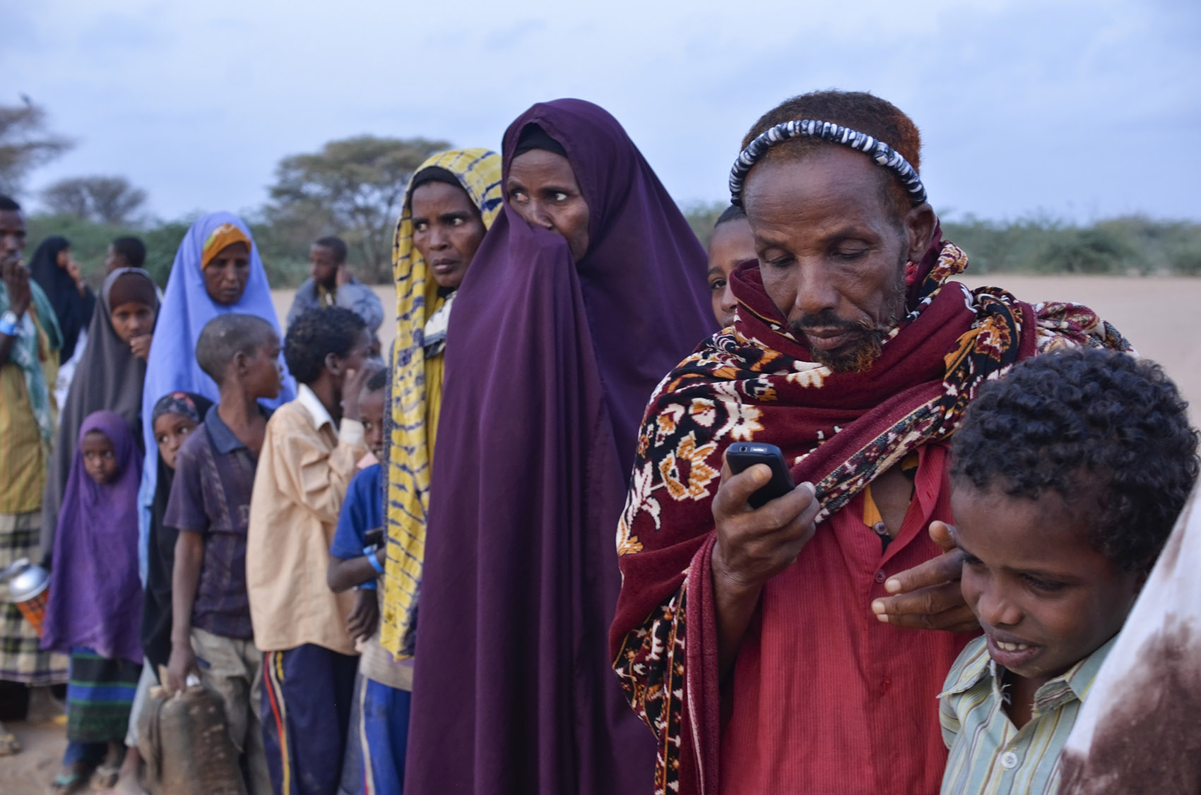 Sahal Gure Mohamed, 62, Texts on his Mobile Phone