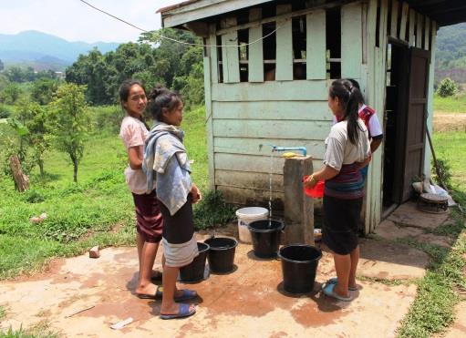 Girls collecting water - Lao PDR